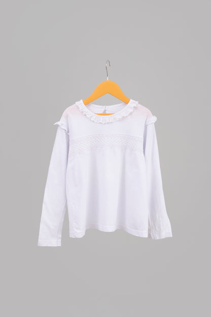 POLERA BLANCA CON VUELOS Y BORDADO PETIT