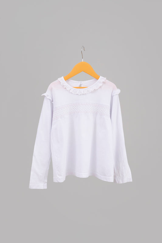 POLERA BLANCA CON VUELOS Y BORDADO PETIT