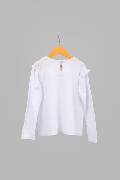 POLERA BLANCA CON VUELOS Y BORDADO PETIT