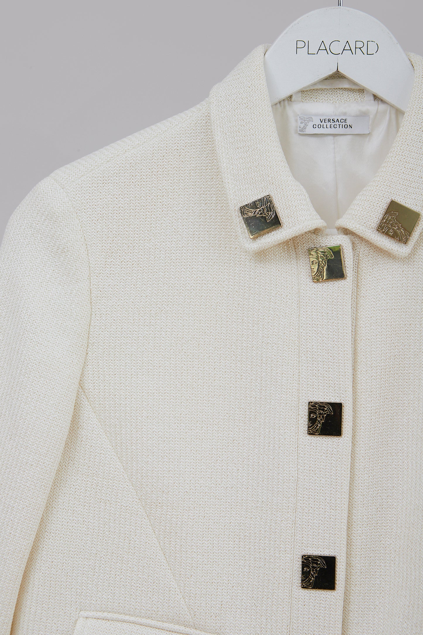 CHAQUETA EN TWEED CON BOTONES NEOCLÁSICOS "GREEK KEY"  [ARCHIVO]